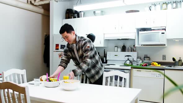 Couple having breakfast at home