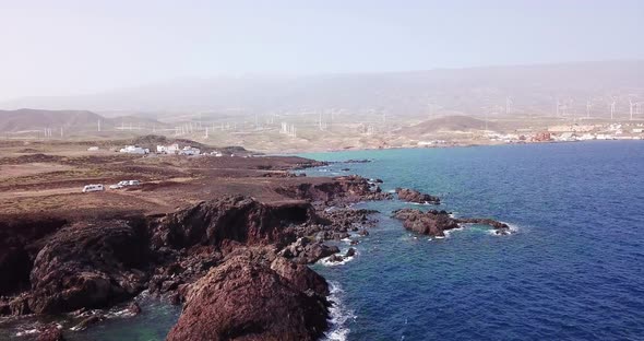 Coastline and beautiful ocean scenic place with little town in background. Sea nature for summer