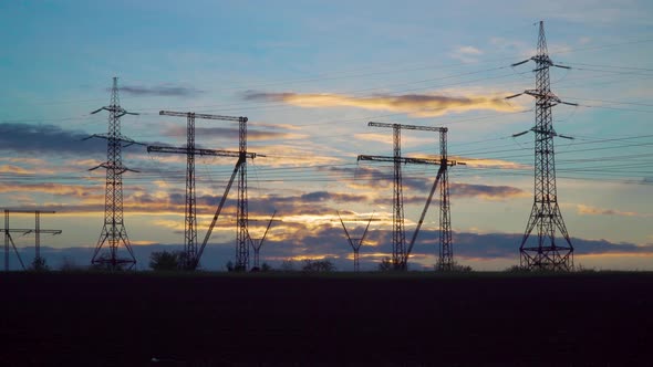 Time Lapse of Clouds Over High Voltage Power Line