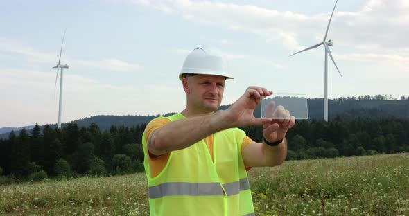 Hand Architect or Engineer Using Smartphone Transparent Hologram Digital Display on the Background