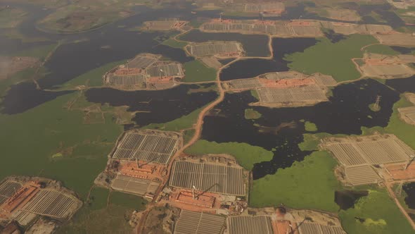 Aerial view of chimneys kilns from brick factory, Dhaka, Bangladesh.