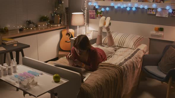 Girl Watching Videos in Hospital Room