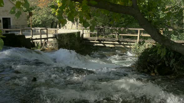 Krka river flowing over rocks
