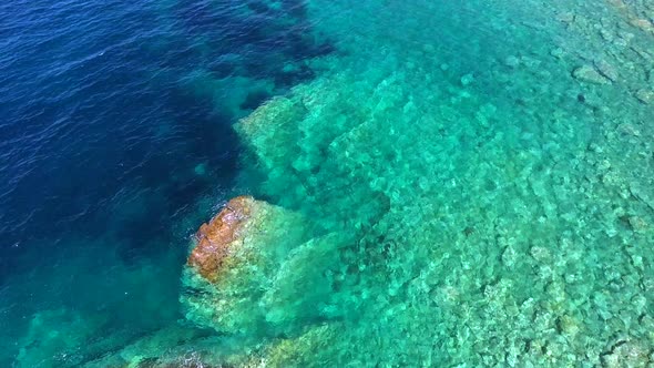 Small Islet Island Formed by the Accumulation of Rock Deposits Atop a Reef in the Sea