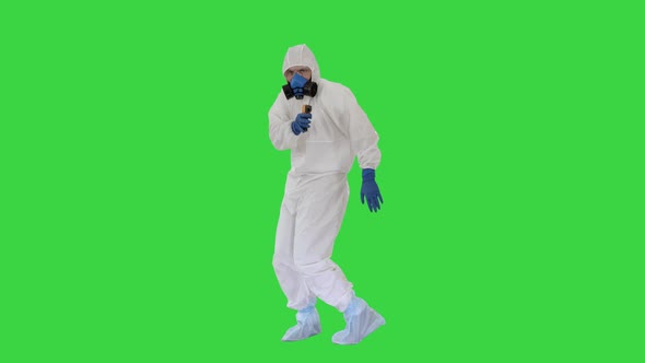 James Bond Parody Doctor Wearing Gloves with Biohazard Chemical Protective Suit Checking Temperature