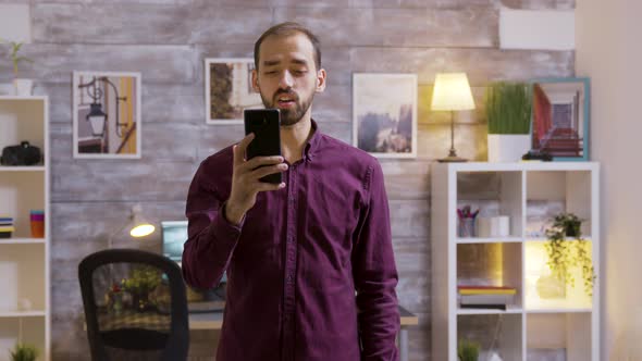 Man Leaving the House Gives a Voice Command and the Lights Are Turning OFF