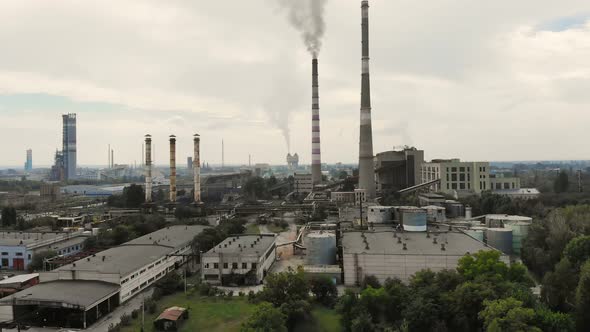 CHERKASY UKRAINE SEPTEMBER 12 2018 Big Power Plant  Factory with Pipes Expelling Smoke Into Sky