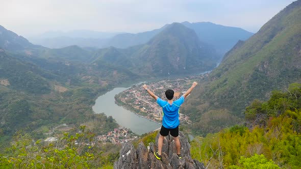 Sport Man Celebrate On Peak Of Mountain