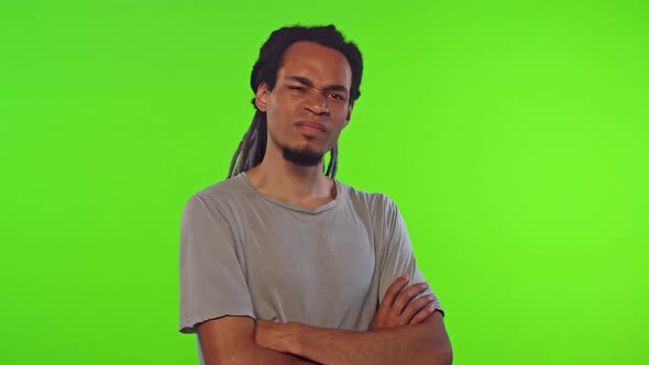 Young African American Man Throws Up Hands Demonstrating Displeasure in Studio