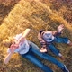 The Kid Stands on the Haystack and Waves His Hands - VideoHive Item for Sale