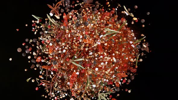 Super Slow Motion Shot of Flying and Rotating Colorful Mix Spices at 1000Fps