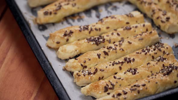 Baked dough sticks just out of the oven, delicious.