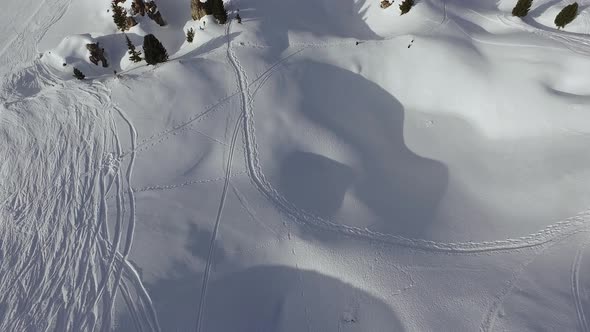 Aerial view of ski tracks on snow