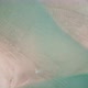 Vertical view of sand and beach with blue clean sea water. Tropical aerial landscape with waves - VideoHive Item for Sale