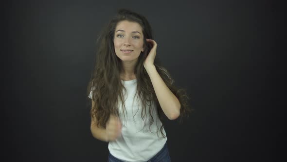 Excited Lady with Long Curly Hair at Etude Role Audition