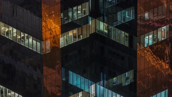 Windows in Office Building Exterior in the Late Night with Interior Lights on Timelapse