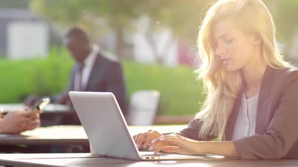 Woman Working in Outdoor Coworking Space