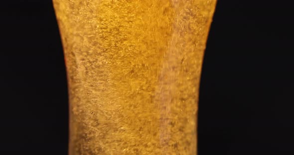 Fresh Foamy Beer is Poured Into Transparent Glass Slow Motion  Movie