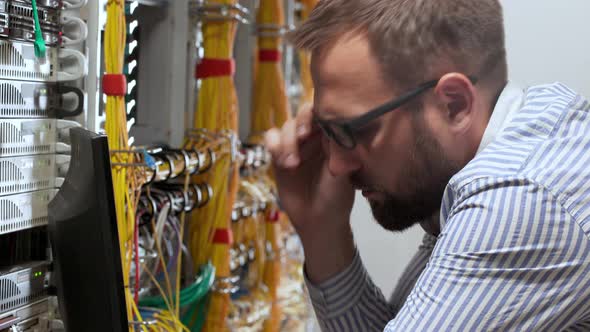 Engineer Working in Data Room