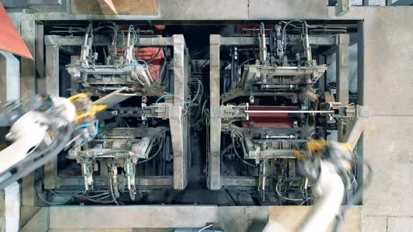 Top View of Copper Plates Getting Processed By Modern Robots