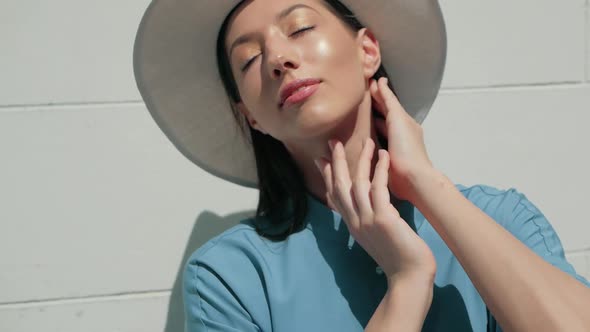 Portrait of Happy Stylish Charming young mixed race woman Fashion Blogger in blue summer dress and w