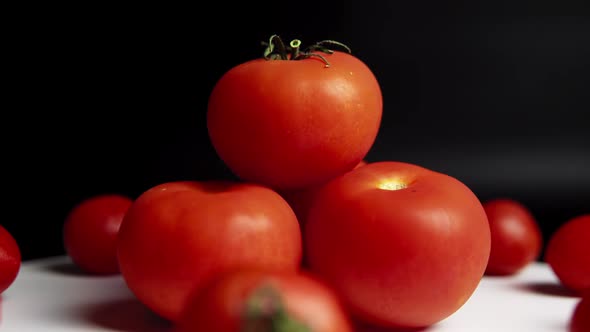 The Rotation of Large Fresh Ripe Washed Tomatoes