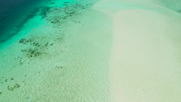 Tropical Beach and Blue Sea with Waves