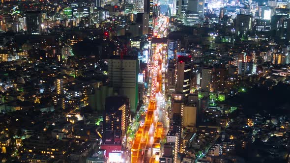 time lapse of the Metropolitan Expressway no.3 Shibuya Line and city at night in Tokyo, Japan