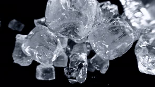 Super Slow Motion Shot of Ice Cubes Flying Towards Camera at 1000Fps