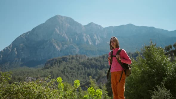 Slow Motion Pretty Young Woman Hiker Walking on Beautiful Mountain Landscape Happy Girl Hiking