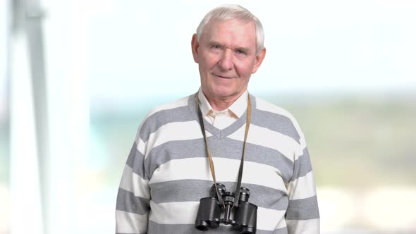 Elderly Man with Binoculars Round Neck