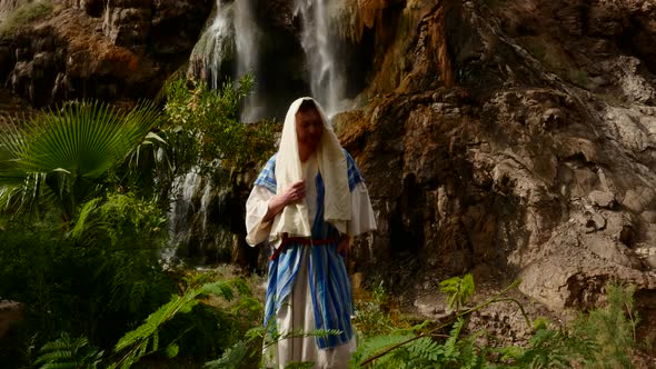 Jew on the Background of a Beautiful Waterfall