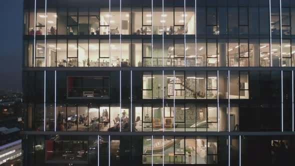 Aerial View of Modern Offices in a Glass Skyscraper at Night