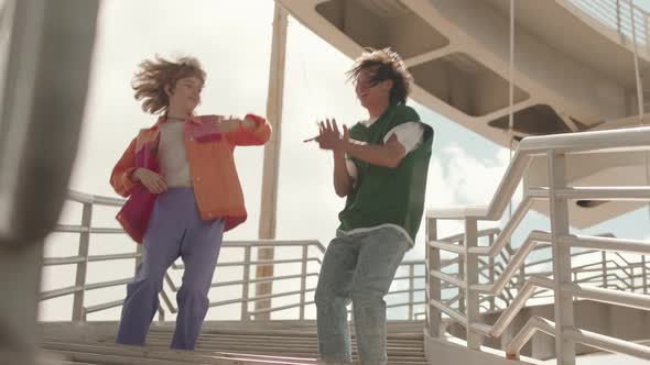 Couple of Dancers Dancing in Synch Outdoors