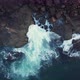 Aerial drone view of ocean blue waves break on high cliff of a rocky mountain - VideoHive Item for Sale