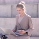 Young Woman Using Laptop on Street - VideoHive Item for Sale