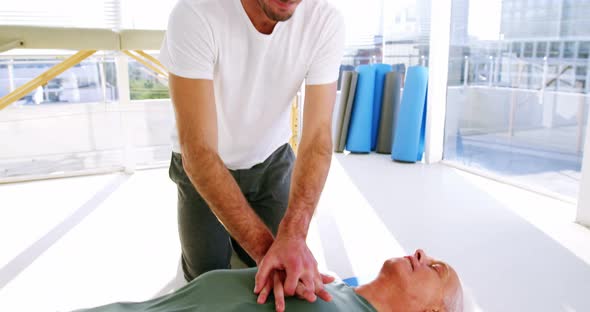 Male paramedic during cardiopulmonary resuscitation