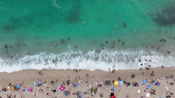 People swim in the sea aerial view 4 K Turkey Alanya