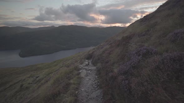 Beautiful view of narrow path in the mountains of lake district after sunset time in england uk