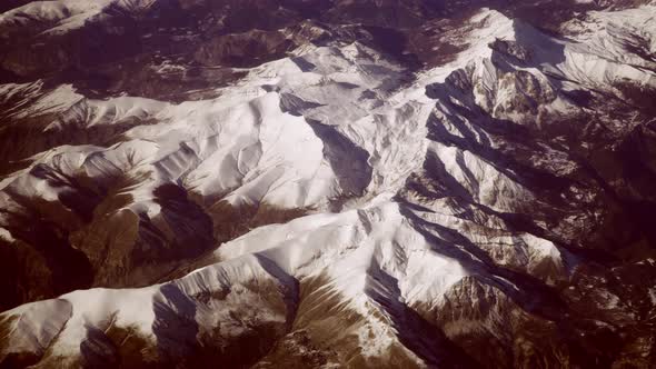 Aerial aircraft view of Alps glaciers above Italy