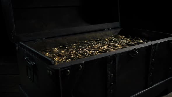 Passing Large Chest Of Gold Coins