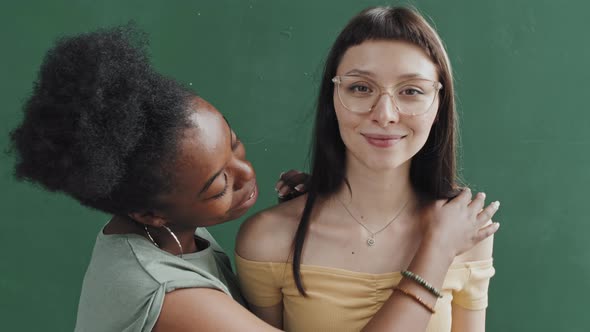 African-American Woman Hugging Girlfriend