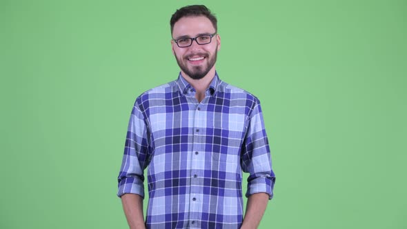 Happy Young Bearded Hipster Man Smiling