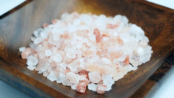 Rotation of raw Himalayan pink salt crystals. 