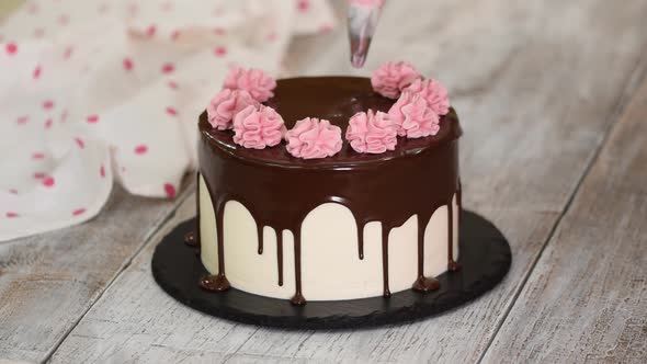 The Pastry Chef Prepares and Decorates the Cake at Home