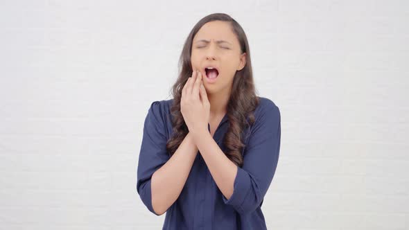 Indian girl having toothache