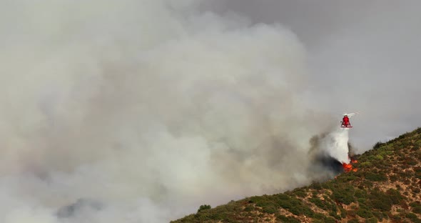 Fighting a Major Wildfire in Los Angeles County, USA. Helicopter Fire Extinguishing