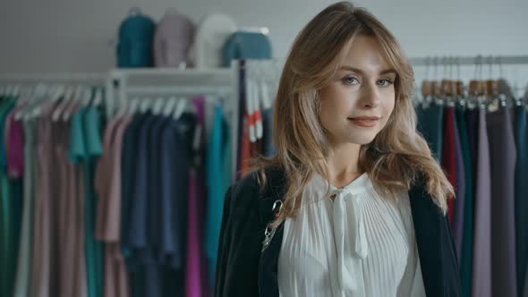 Stylish Lady Smiling for Camera in Shop