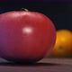 Delicious Tomato of Red Colour Falls on Brown Wooden Table - VideoHive Item for Sale