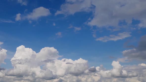 Blue sky and moving clouds